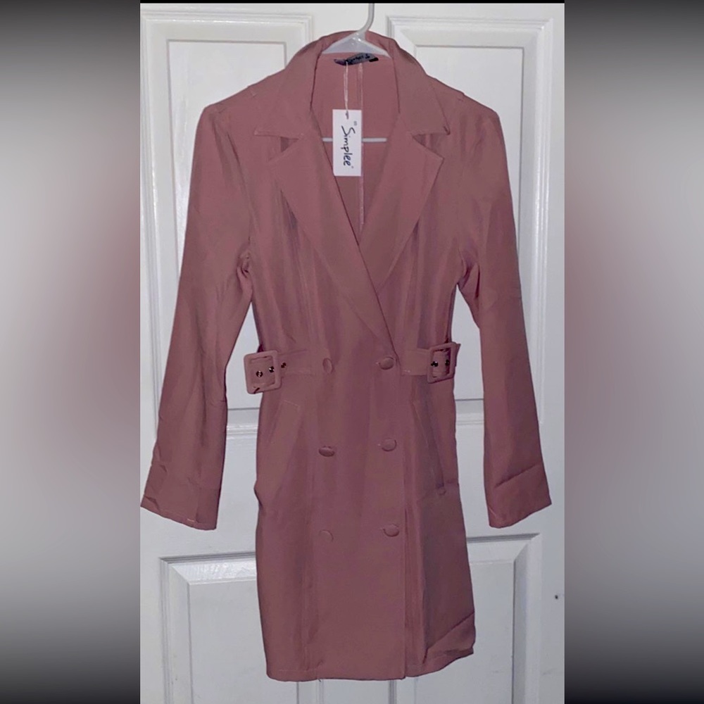 This is a pink blazer jacket that I have never worn it.